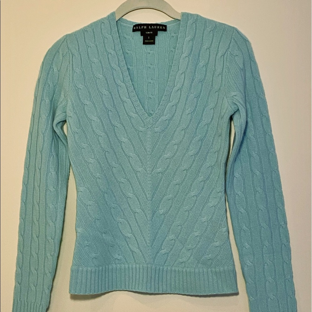 Bundled Ralph Lauren cashmere sweaters.